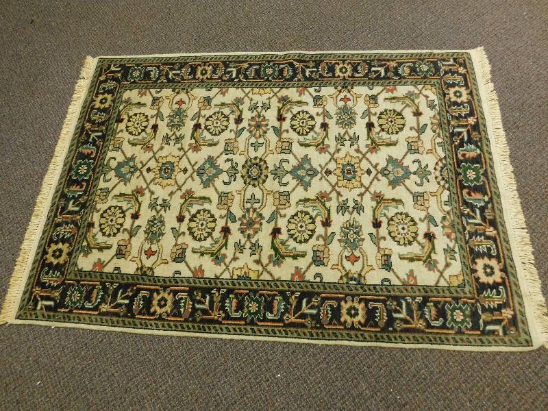 lot 9083 image: 76 x 51 Frill Edged  Floral Area Rug.