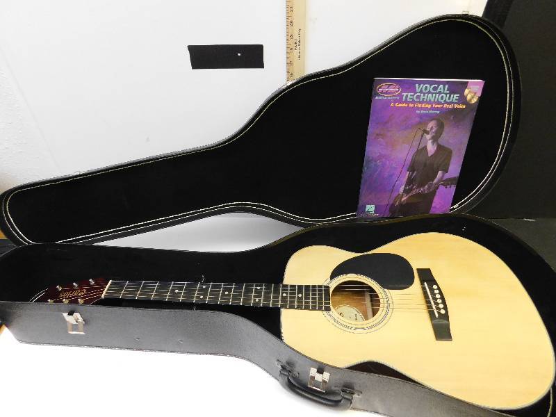 lot 9085 image: Carlos Vintage Acoustic 6 String Guitar. Like NEW or Mint Condition. Latching Travel Case and Book.