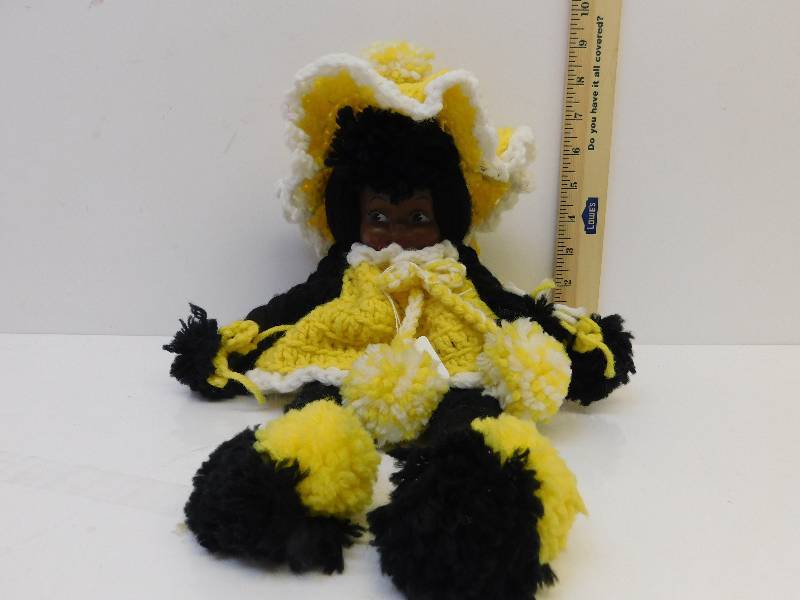 lot 9125 image: Vintage Girl Baby Doll w Yellow Yarn Outfit  Hat.