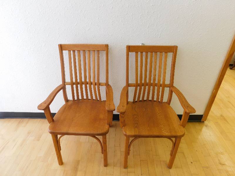 lot 9134 image: Two Desk Style Inspired Pinewood Arm Chairs.