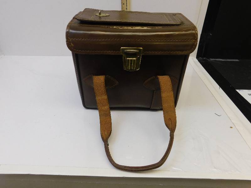 lot 9150 image: Hand Waxed G.E. Square Leather Authentic Top Grain Cowhide. Button Latch Handled Bag.13