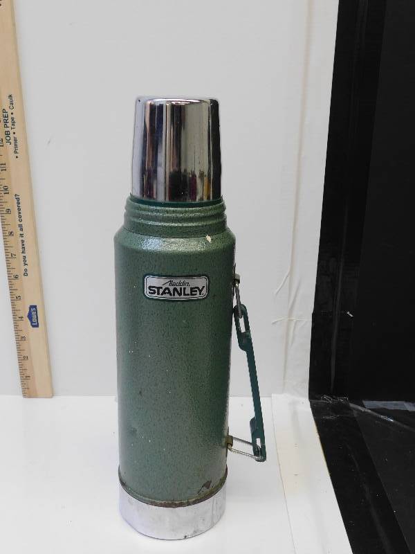 lot 9156 image: Classic Aladdin Stanley Thermos w Original Cap and Mouth Guard.