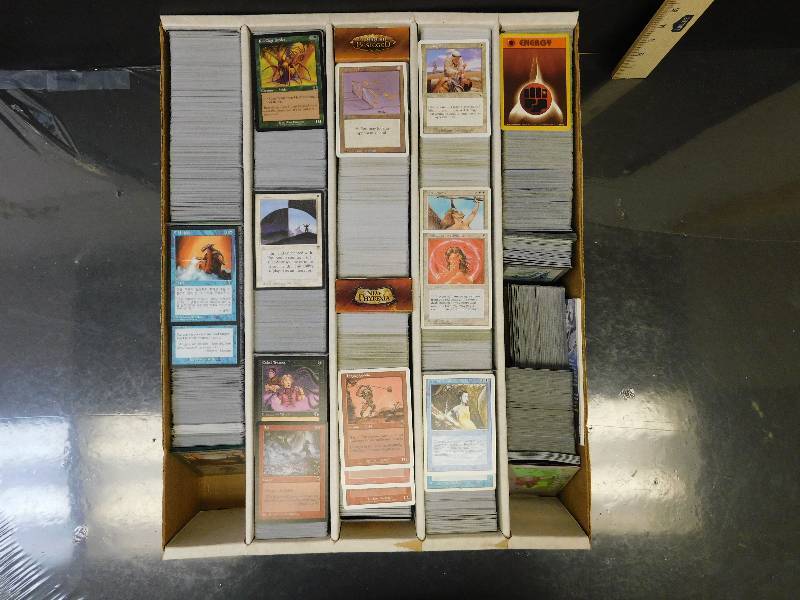 lot 9176 image: Thousands of Magic the Gathering  Pokemon Cards. (Maybe 100 Pokemon Cards in the whole Lot)