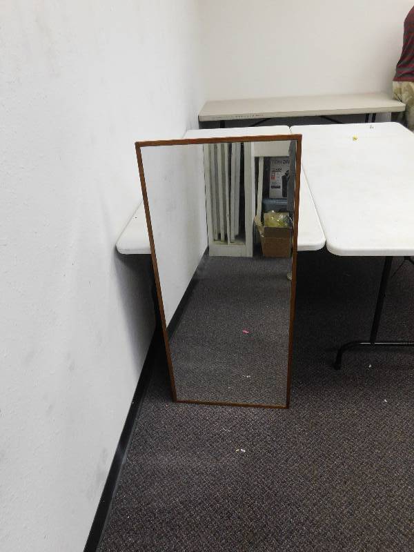 lot 9191 image: 44 x 20 Standard. Hardwood Backed Wall mirror.