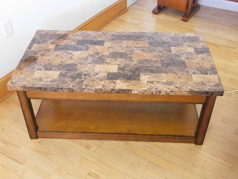 lot 9206 image: 19 T, 48 L, 26 W. 2 Tier Granite Impression Hardwood Coffee Table.