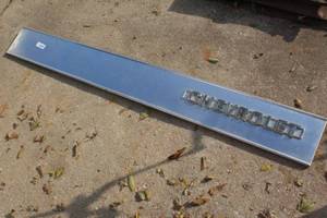 lot 2481 image: Square Body Chevrolet Truck Tailgate Trim