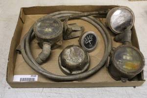 lot 2510 image: Antique Car Gauges & Hubcap