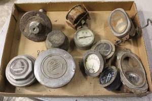 lot 2583 image: Antique Car Parts Lot Gauges Hubcaps
