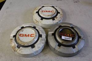 lot 2632 image: Vintage GMC Hubcaps