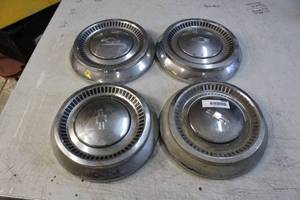 lot 2633 image: 1964 Chevrolet Hubcaps