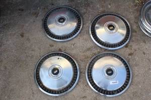 lot 2506 image: Lot of 4 1970s Ford F150 Wheel Covers