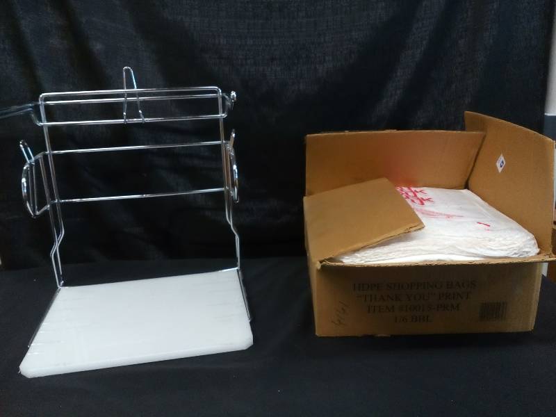 lot 8 image: T-Shirt Bag Stand With A Case of Bags