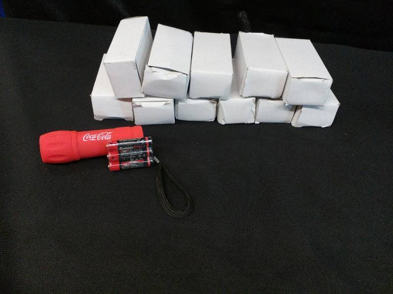 lot 105 image: Coca- Cola LED Pocket FlashLights