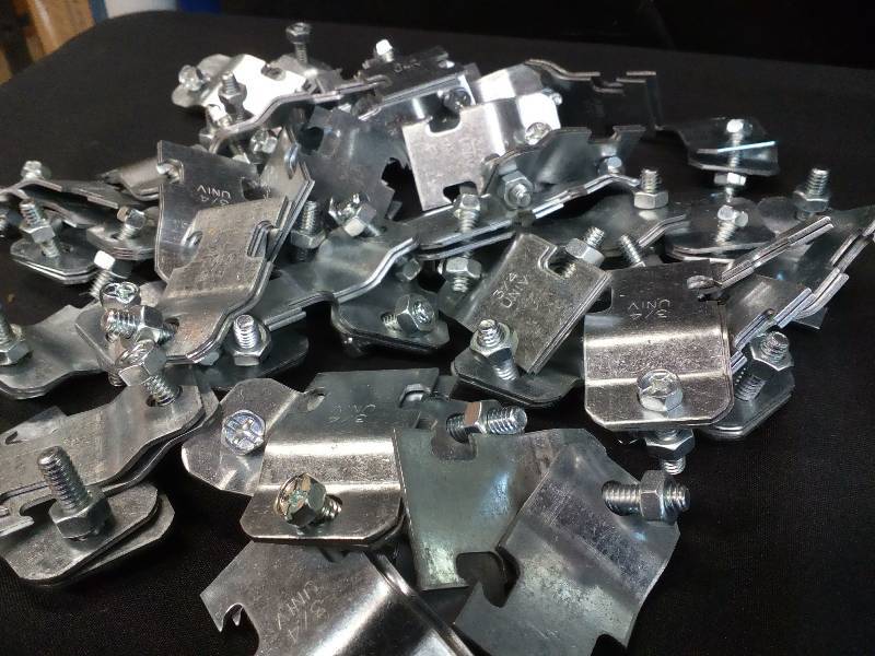 lot 164 image: 34 Universal Two-Piece Pipe Clamps