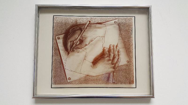 lot 1008 image: M.C. Esher Drawing Hands Lucid Lines Series 1974 Print on Glass 14 x 11 Framed