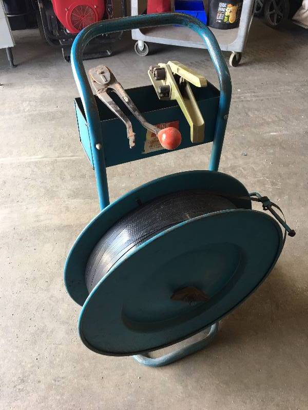 lot 68 image: ULINE PLASTIC BANDING KIT WITH DOLLY TOOLS AND EXTRA ROLL OF BANDING