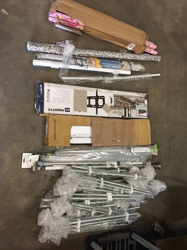 lot 35 image: HOUSHOLD GOODS LOTS OF SHOWER CURTAIN RODS WRAPPING PAPER TV MOUNT BLINDS AND MORE