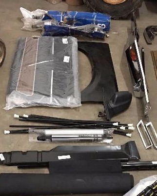 lot 18 image: AUTOMOTIVE LOT CLASSIC CAR PARTS AXLES FLOOR MATS AND MORE