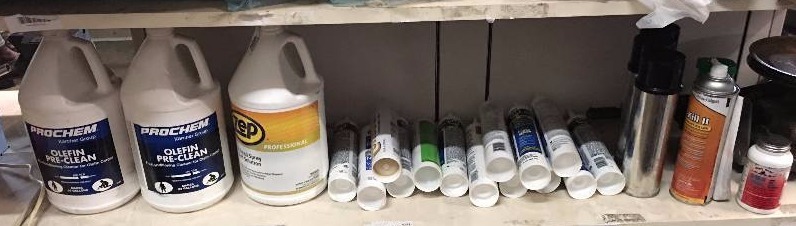 lot 128 image: CALKING AND ADHESIVE LOT