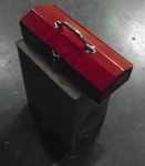 Small Red Metal Tool Boxes.