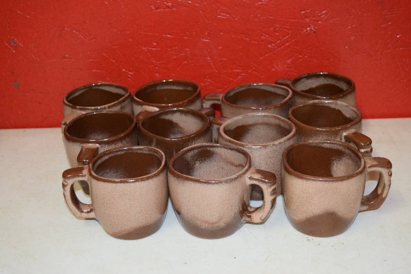 lot 89 image: 11 Frankoma Lazy Bones Mugs