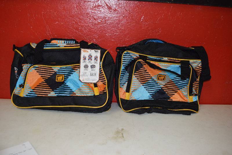 lot 242 image: Loud Mouth Micro Wave Carry-On Set