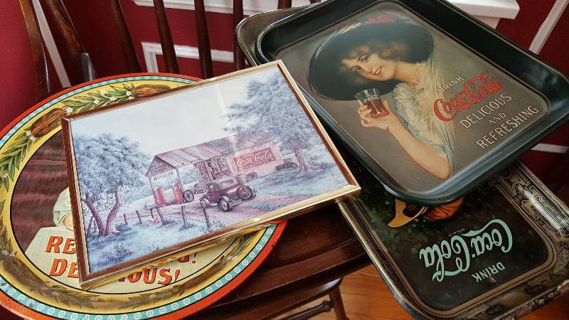 lot 6625 image: Lot of Reproduction CocaCola serving trays.  Beautiful colors and have been hanging on a wall and do have small nail holes in each one