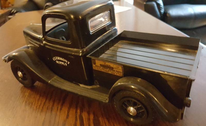 lot 6629 image: Collectable Beam (full) Decanter of Kentucky Straight Bourbon Whisky in this Clermont Supply display truck