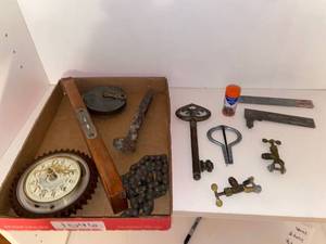 lot 1046 image: Clock, chain, measuring tape, ruler, key