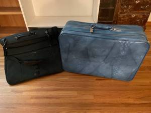 lot 1066 image: American Tourister large suitcase and a Samsonite garment bag