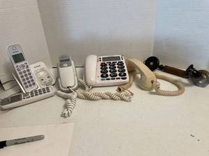 lot 1087 image: Panasonic two set phone, AT&T phone, Radio Shack large Number keys phone, And antique handset