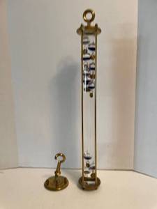 lot 1088 image: 22 inch tall Galileo thermometer with stand and hanging hook