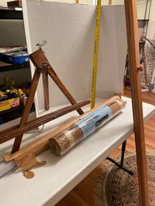 lot 1100 image: Easel, cork roll, cellulose acetate and long board