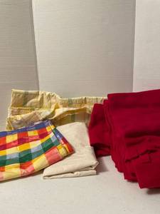 lot 1114 image: Material and seven belt scarves