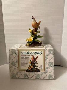 lot 1122 image: Andreas Birds. Carolina wren on wooden base. Chipped beak