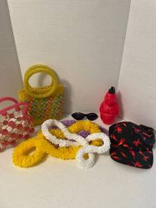 lot 1131 image: Two handbags made in Italy, Chili pepper baseball cap and more