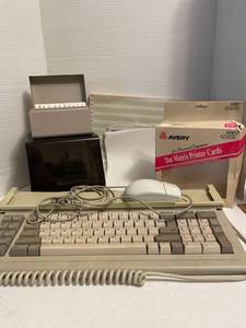 lot 1161 image: Computer keyboard and mouse, plastic file case, note card file and cards, and miscellaneous computer paper
