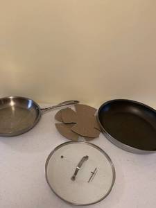 lot 1215 image: NSF 14 and Zwilling 11 inch frying pans and misc lid