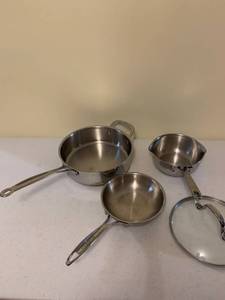 lot 1217 image: Cuisinart 10 inch, Emeril 7 inch and USA 7 inch pan