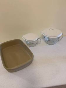 lot 1303 image: Pampered Chef baking pan and measuring cups