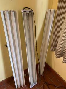 lot 1351 image: Three fluorescent light fixtures, 48 inches