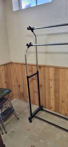 lot 2010 image: Portable clothes rack adjustable 60x35.5 on wheels