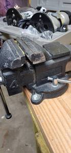lot 2114 image: Bench vise attached bring tools 716