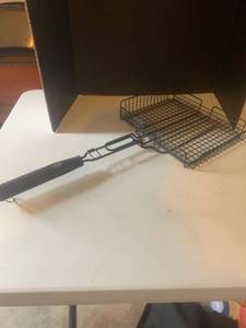 lot 3002 image: Outdoor hotdog cooker. For cooking over a campfire