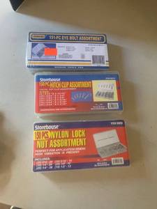 lot 3005 image: Miscellaneous lock nut assortment hitch clips and eye bolt