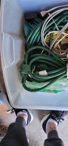 lot 3114 image: Tote full of extension cords of all sizes