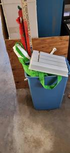 lot 3134 image: Trash can, yard sticks, plastic bags, caulking gun, bag of rags and more