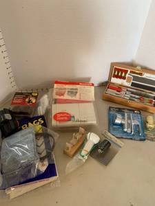 lot 3227 image: Honeywell thermostat, Vacuum accessories, storm door knobs and hobby knife set