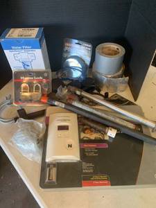 lot 3621 image: Miscellaneous household items. Master locks with keys. Safety glasses. tape. water filter and more