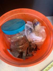 lot 3629 image: Bucket with various L brackets hinges. screws. nails and more
